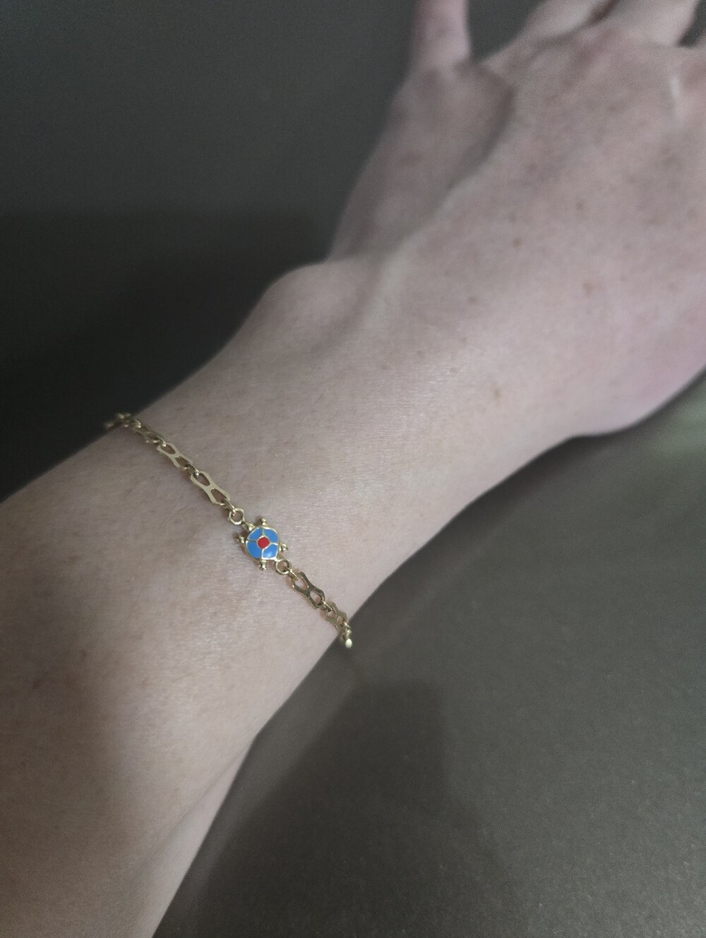 14 K Gold Link Bracelet with Blue and Red Flower Charm